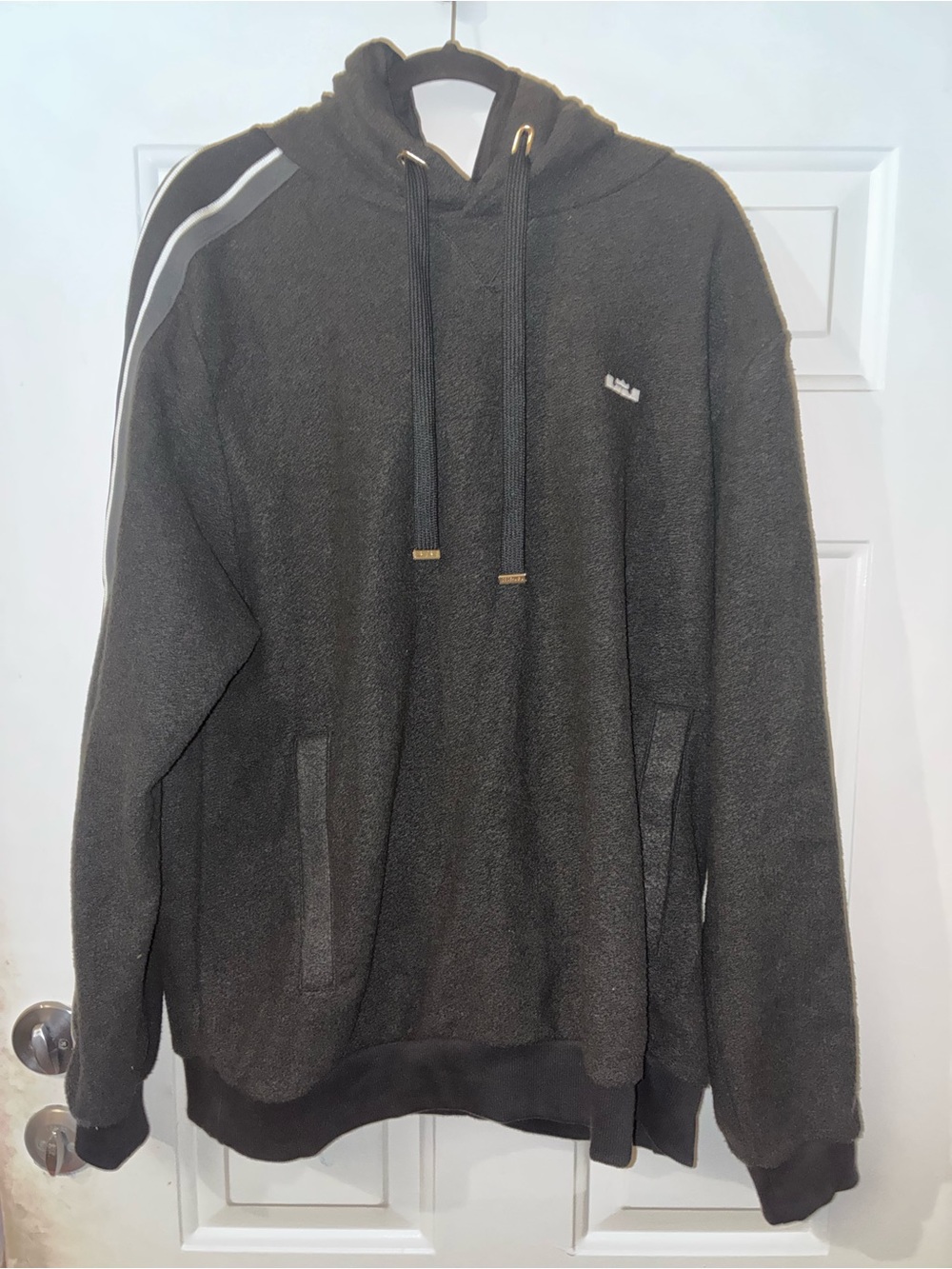 Nike Black Pullover Hoodie with White Shoulder Stripe